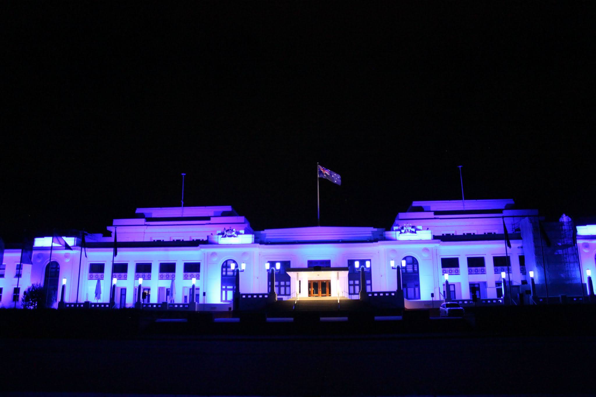 Museum of Australian Democracy lit up in blue light for International Angelman Day